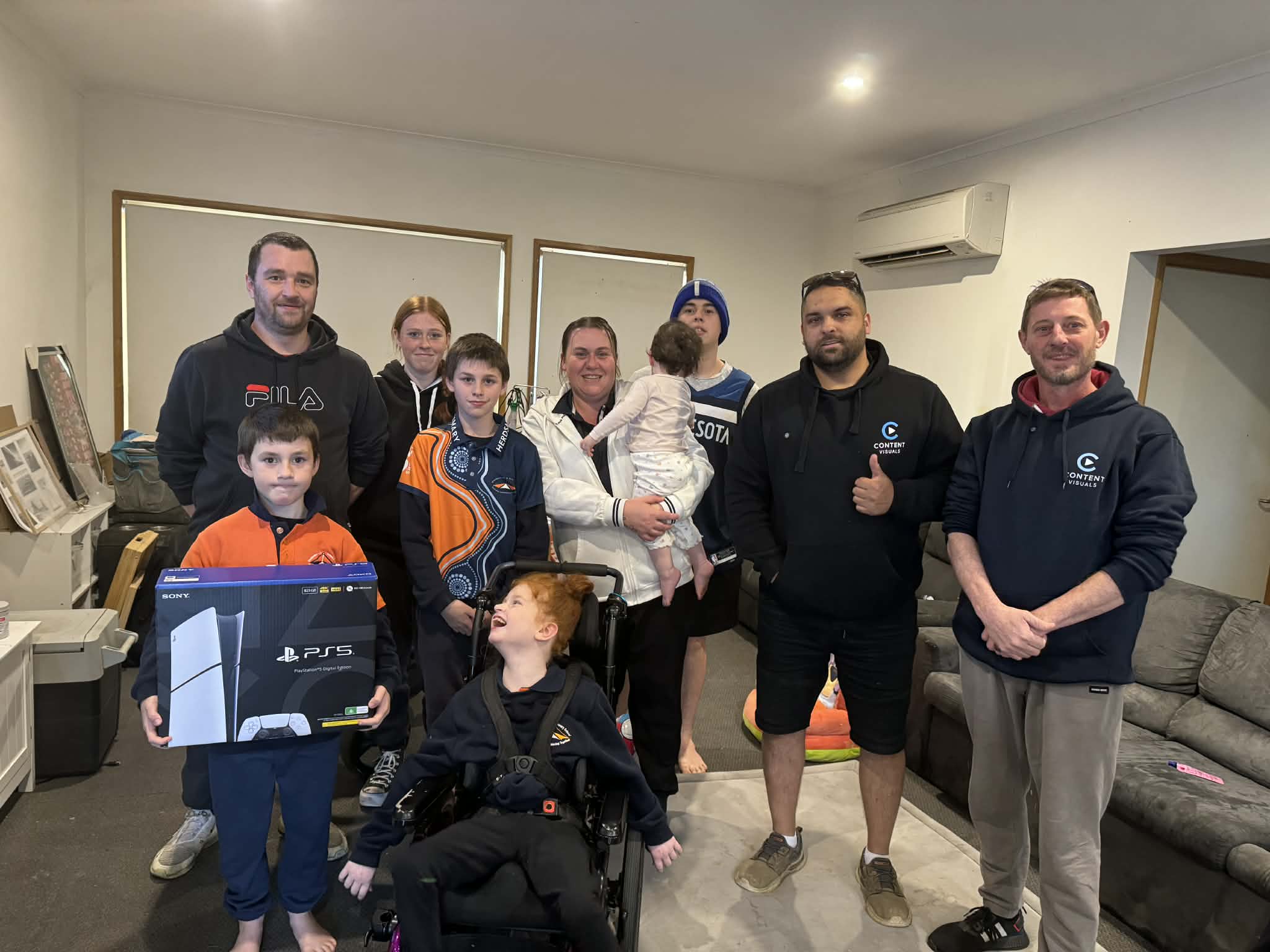 Nat Joseph with her family receiving her prize
